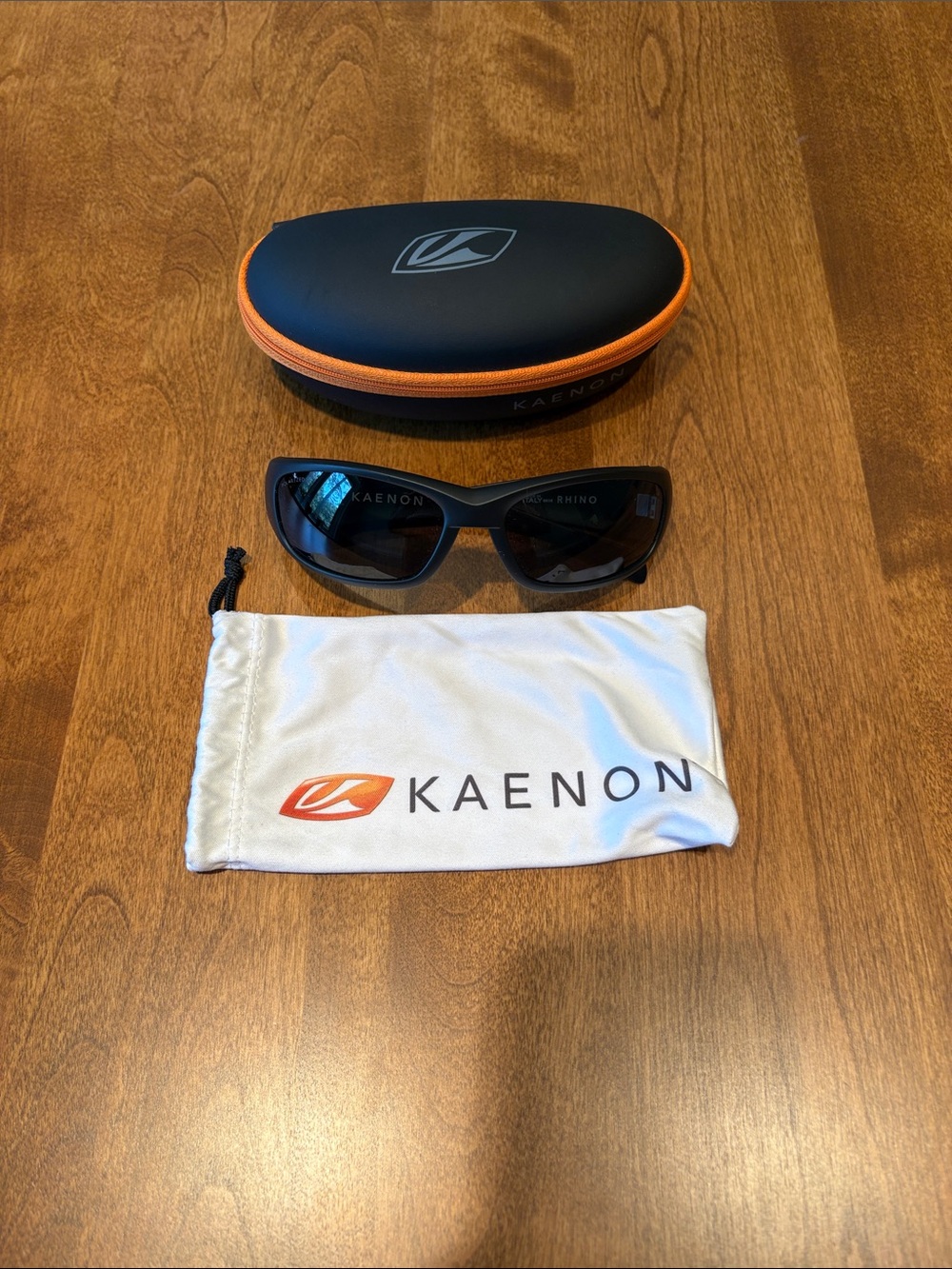 Kaenon Rhino Black Sunglasses with Case and cloth pouch.